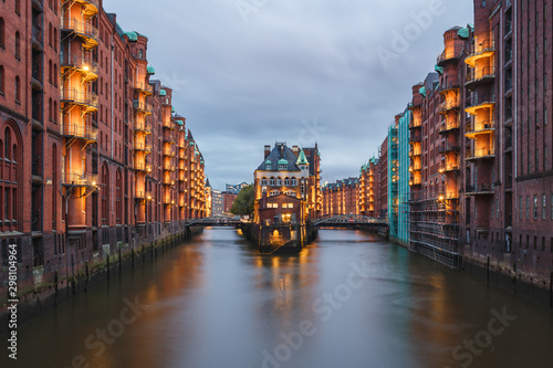 Night View of Illuminating Speicherstadt Warehouses along the Canal, Hamburg, Germany
