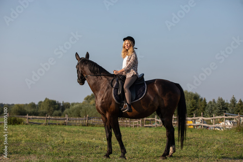 Girl riding a horse, Young girl riding a horse © wip-studio