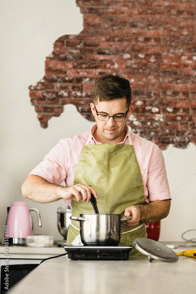 Man serving soup Man serving soup