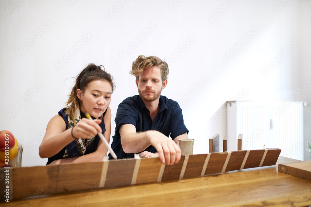 Two industrial designer working in their office 02 Two industrial designer working in their office 02