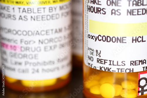 Opiod prescription pain pills on a table.