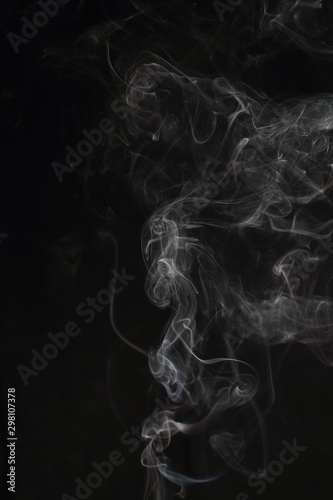 Abstract white smoke texture on black background