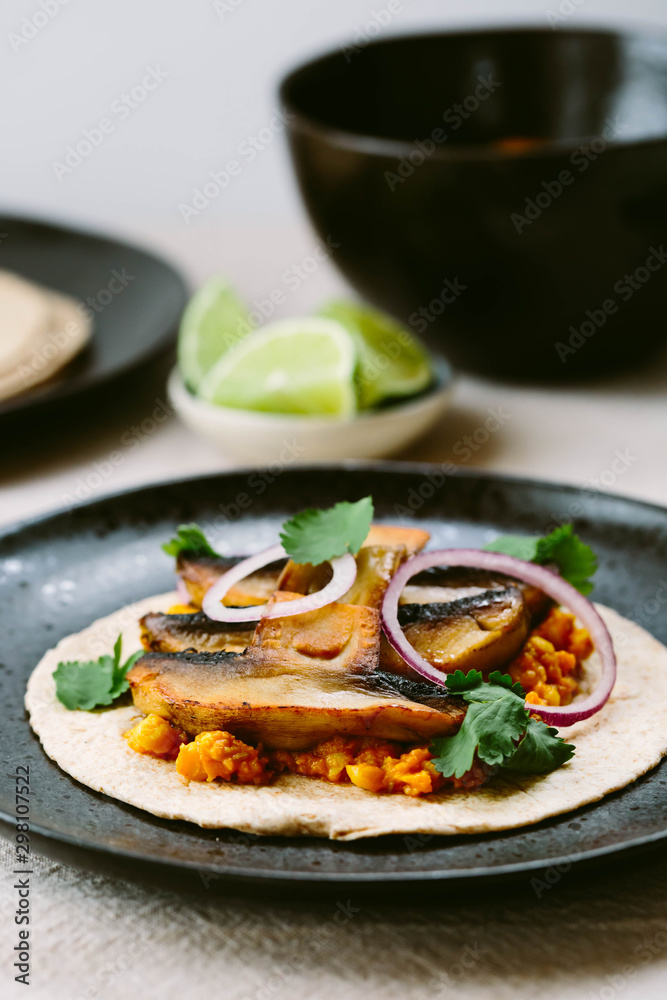 Indian spiced mushrooms with dal in a wrap. Indian spiced mushrooms with dal in a wrap.