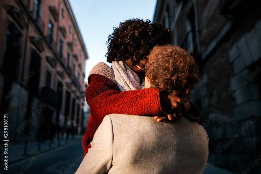 Multiethnic young couple having romantic moments Multiethnic young couple having romantic moments