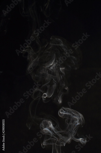 Fototapeta Naklejka Na Ścianę i Meble -  Abstract white smoke texture on black background