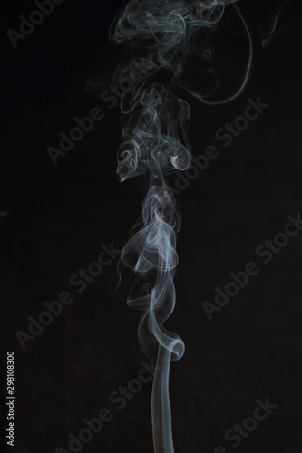 Abstract white smoke texture on black background