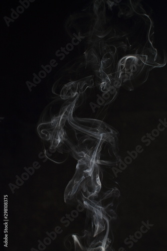 Abstract white smoke texture on black background