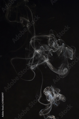 Abstract white smoke texture on black background