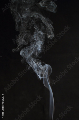 Abstract white smoke texture on black background