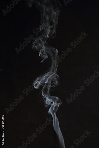 Abstract white smoke texture on black background