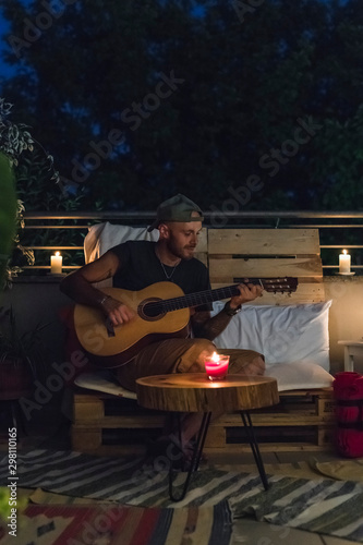Wallpaper Mural Cool man playing guitar on the rooftop Torontodigital.ca