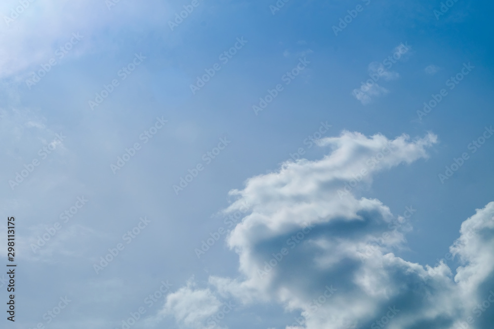 Fototapeta premium Blue sky with big beautiful white clouds. Beautiful background