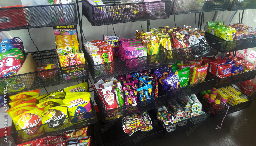 KUALA LUMPUR, MALAYSIA -JULY 28, 2019: Packed miscellaneous junk foods