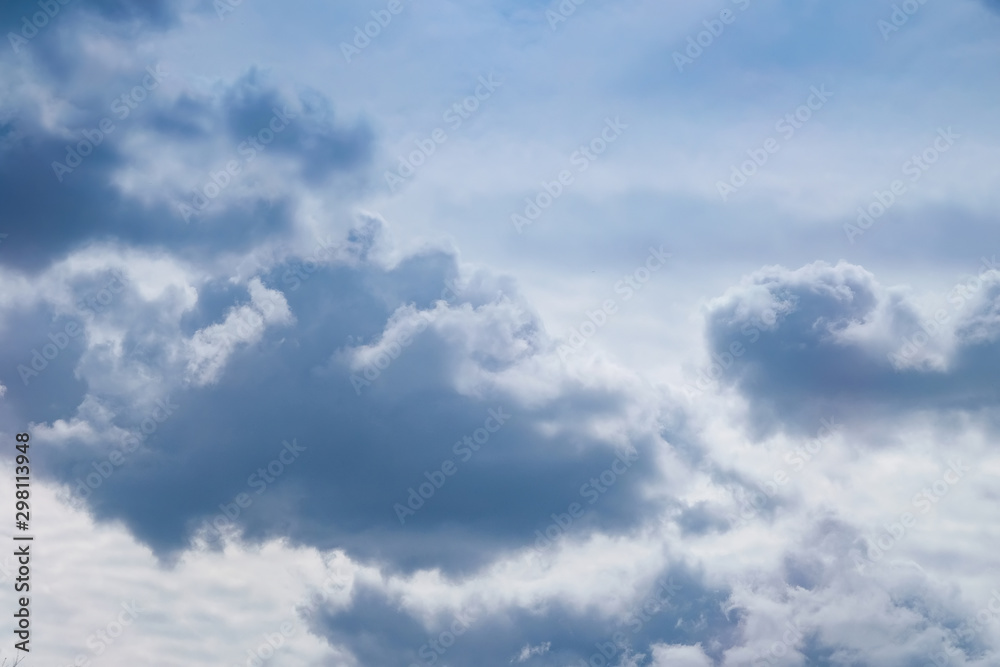 Blue sky with big beautiful white clouds. Beautiful background