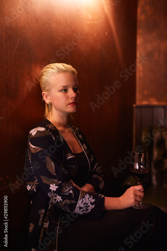 A lonely lady in a bar. photo