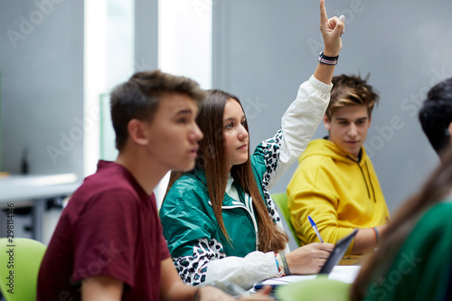 Teenage students participating in the class