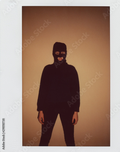 Young woman In Black Balaclava photo