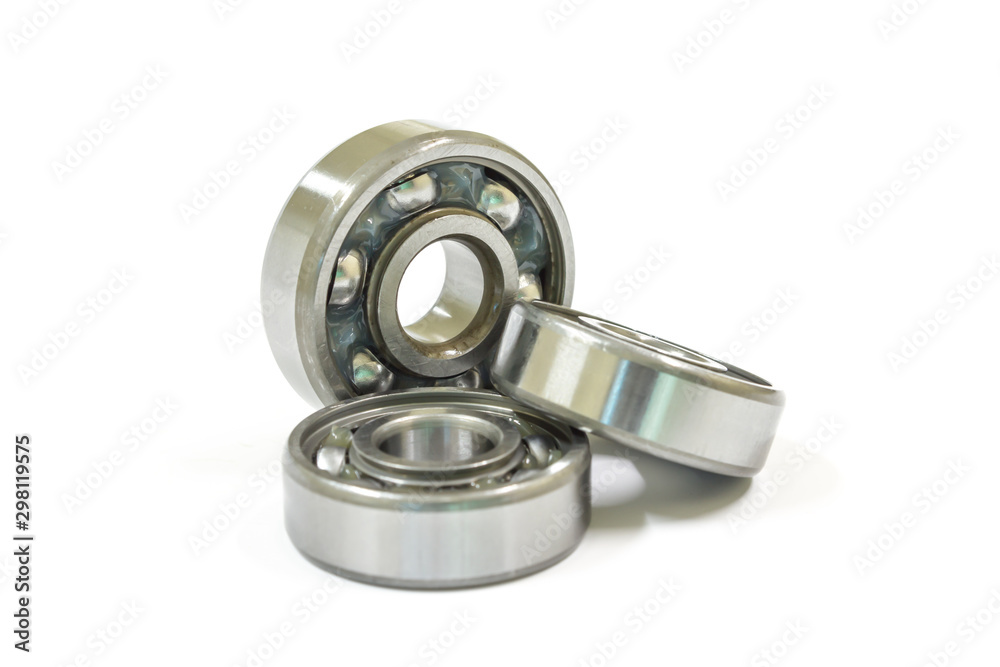 Ball bearing on a white background, Motorcycle bearing close-up. Ball bearing on a white background, Motorcycle bearing close-up.