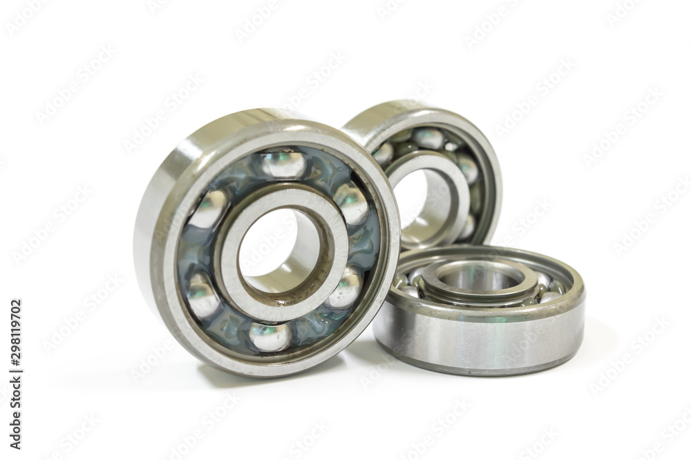 Ball bearing on a white background, Motorcycle bearing close-up. Ball bearing on a white background, Motorcycle bearing close-up.