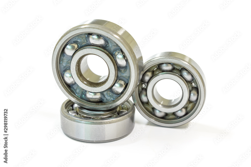 Ball bearing on a white background, Motorcycle bearing close-up. Ball bearing on a white background, Motorcycle bearing close-up.