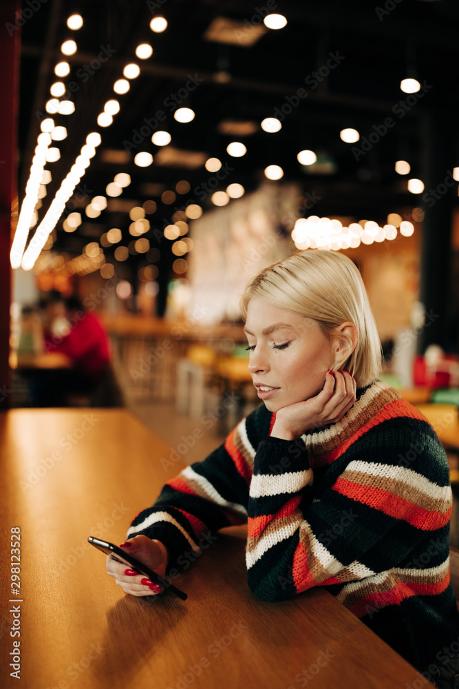 young blond woman on the phone young blond woman on the phone