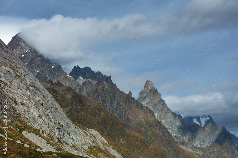 Beautiful scenery from the Italian Alps with picturesque rivers and waterfalls, cliffs and magical mountain valleys