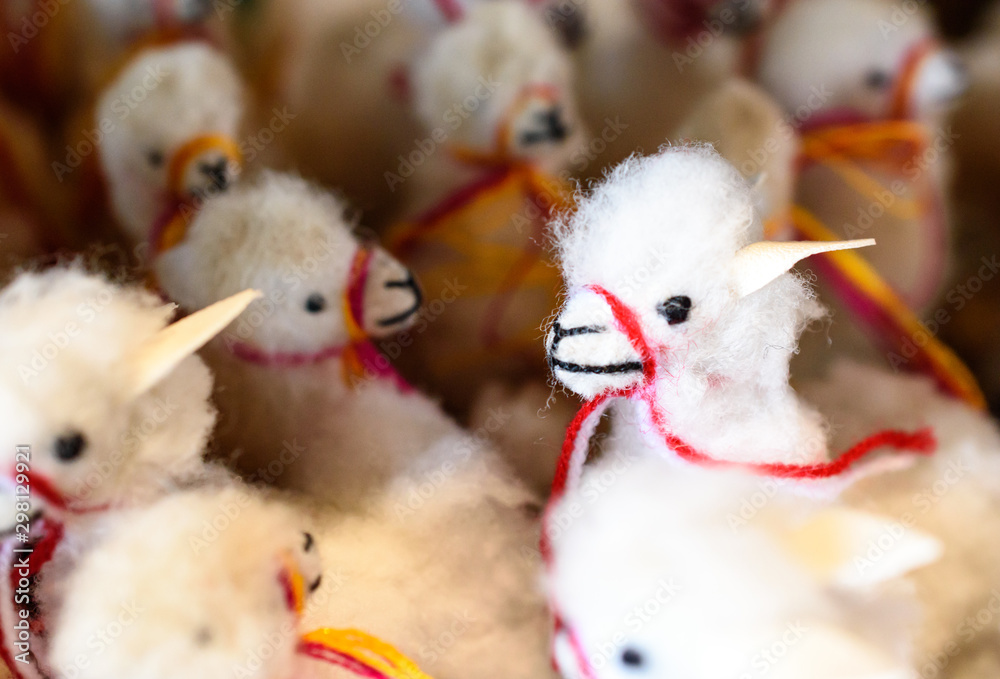 Close-up of mutliple woolie alpaca plushie stuffed animals Close-up of mutliple woolie alpaca plushie stuffed animals