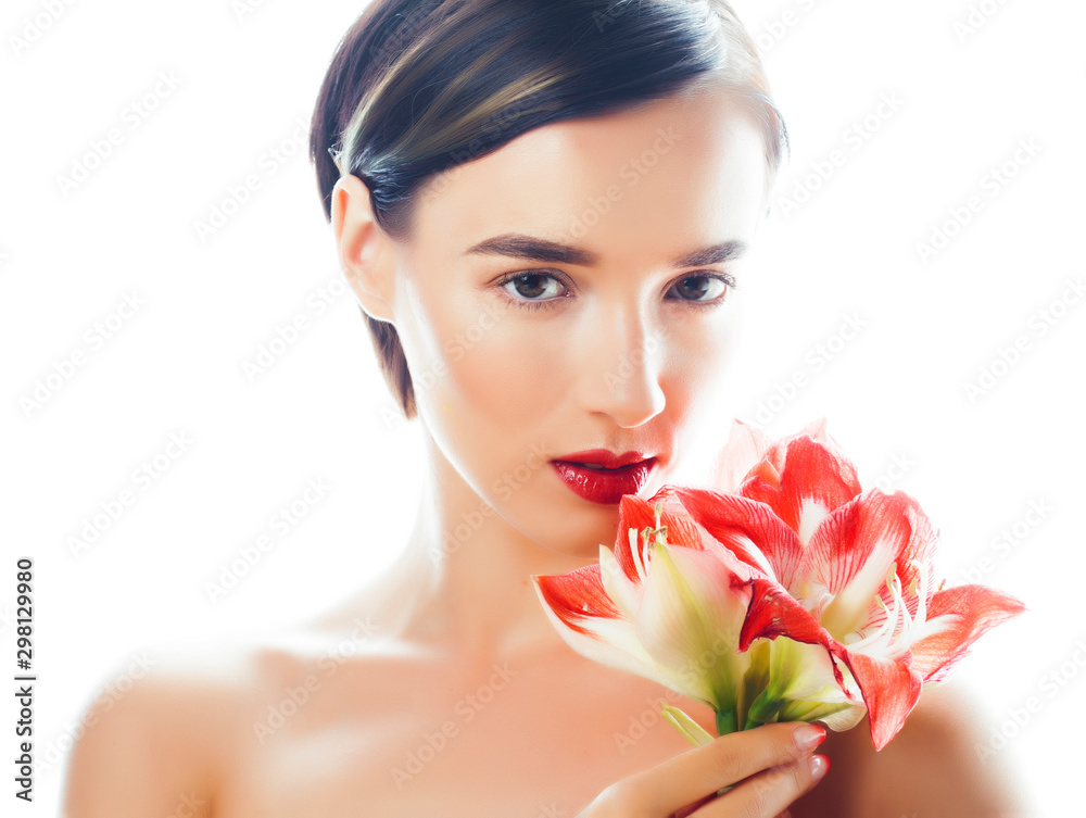 young pretty brunette real woman with red flower amaryllis closeup isolated on white background. Fancy fashion makeup, bright lipstick, creative Ombre manicured nails young pretty brunette real woman with red flower amaryllis closeup isolated on white background. Fancy fashion makeup, bright lipstick, creative Ombre manicured nails