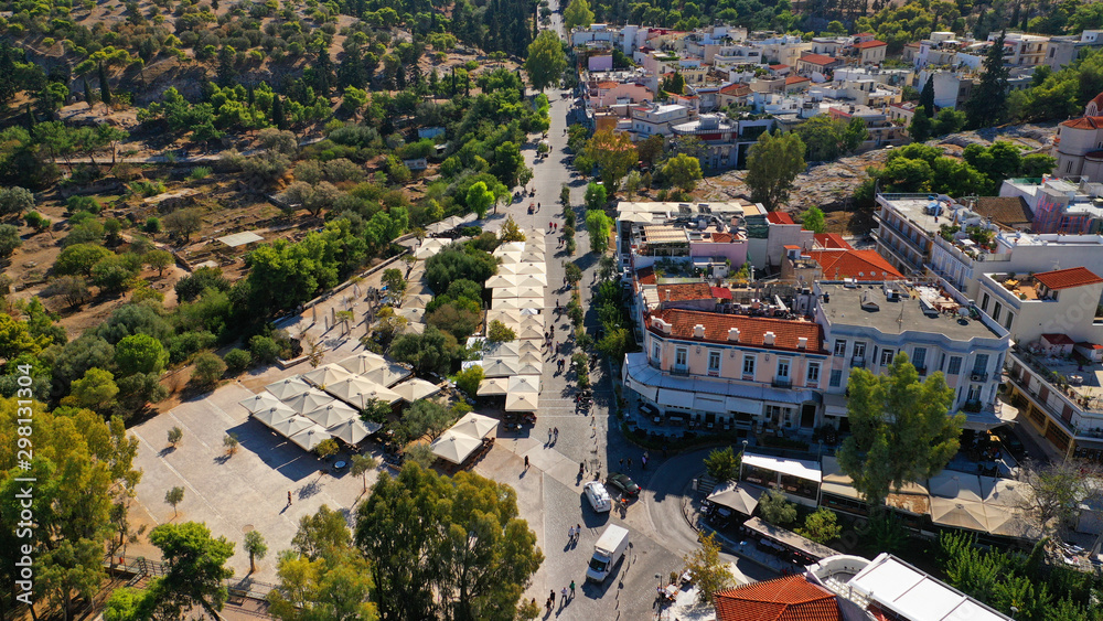 Fototapeta premium Aerial drone photo of popular picturesque area of Thiseio with great views to Acropolis hill and the Parthenon and great pedestrian road of Dionisiou Areopagitou, Athens, Attica, Greece