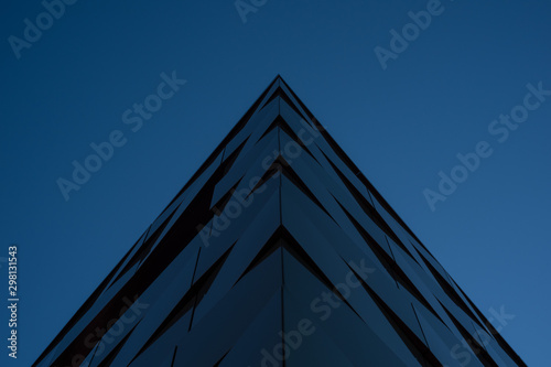 Blue glass abstract building under sky