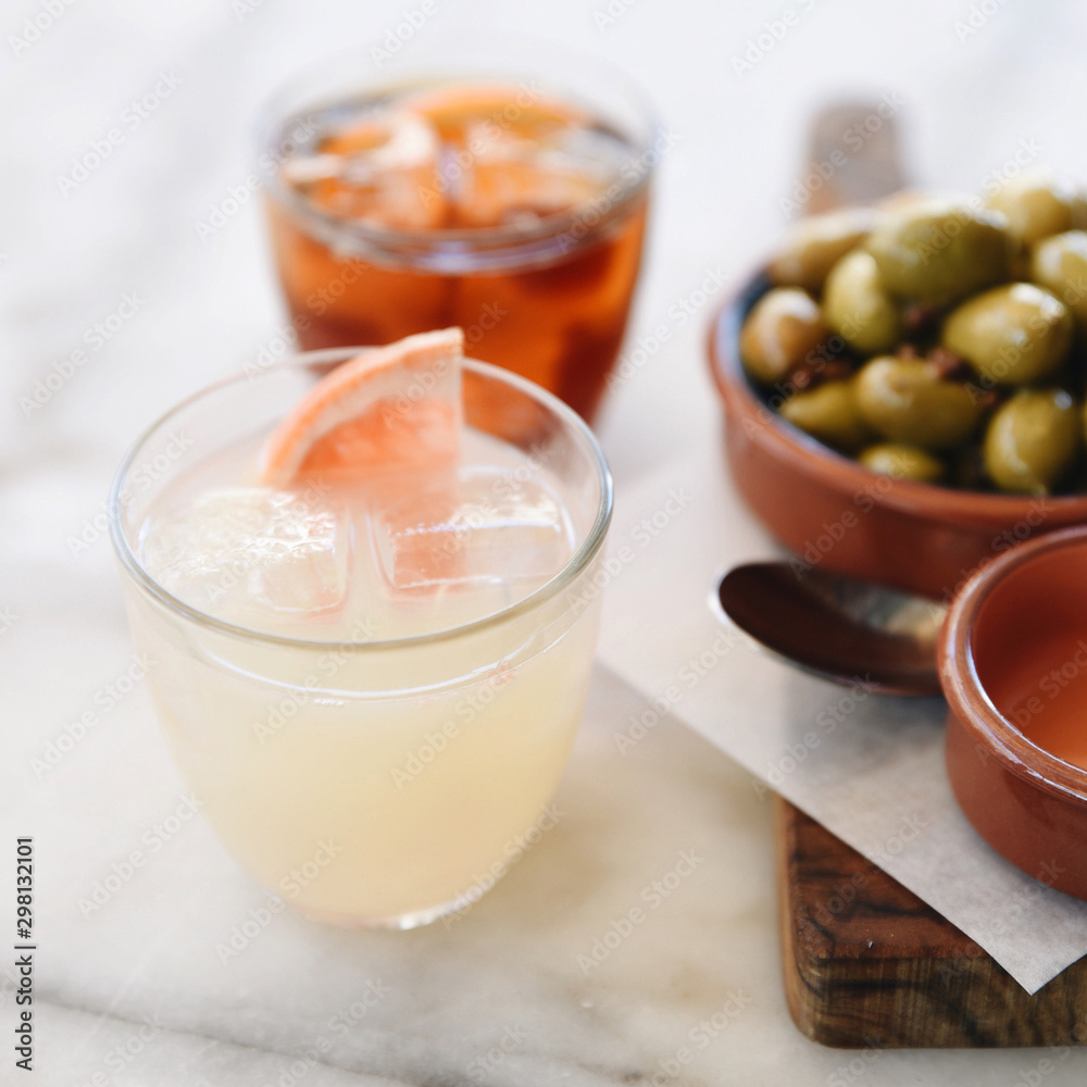 Close up of drink served in glass on marble