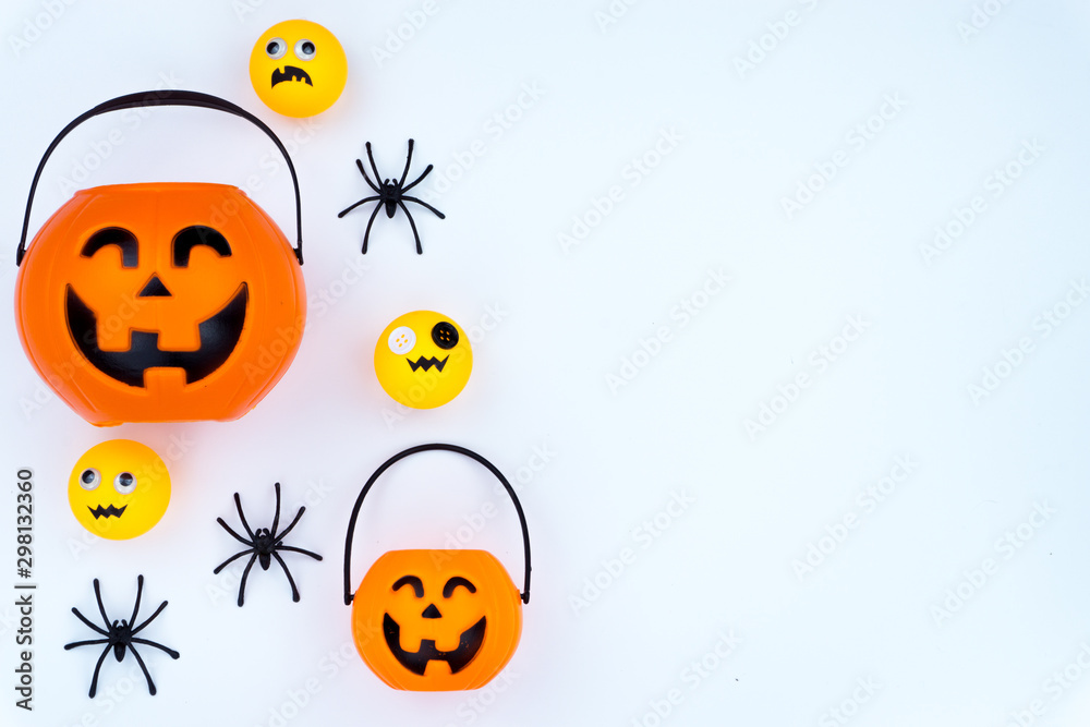 Top view of Halloween decoration, jack o lantern, ghost, bat and spider on white background with copy space for text. halloween concept.