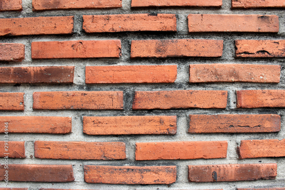 Fototapeta premium Red brick wall as a background