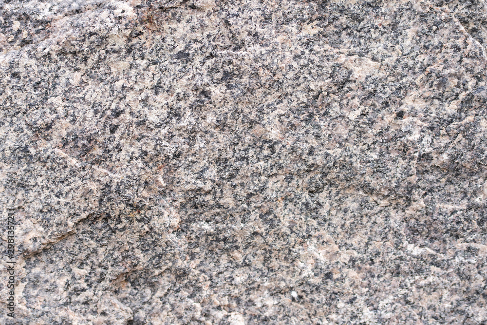 Background porous stone granite texture close up Background porous stone granite texture close up