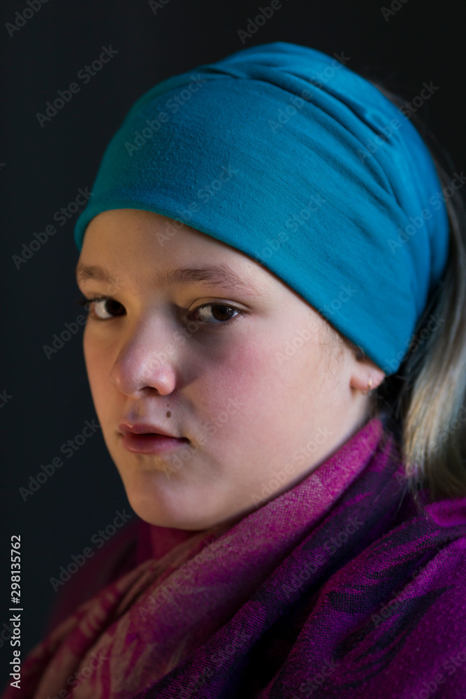 Old painting style vertical closeup portrait of solemn looking beautiful preteen young girl wearing large hairband and shawl staring with dark eyes Old painting style vertical closeup portrait of solemn looking beautiful preteen young girl wearing large hairband and shawl staring with dark eyes