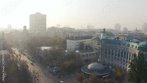 Aerial fly over Institutska street and Kreshchatyk metro station at foggy weather. Problem of pollution of the environment 4k photo