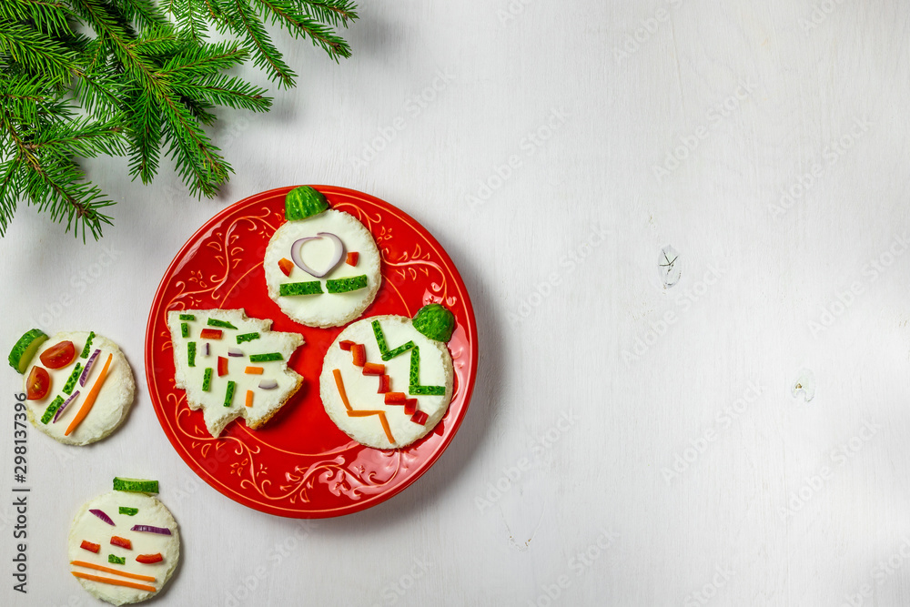 Christmas Tree Ornament Made From Christmas sandwiches on the plate Christmas Tree Ornament Made From Christmas sandwiches on the plate