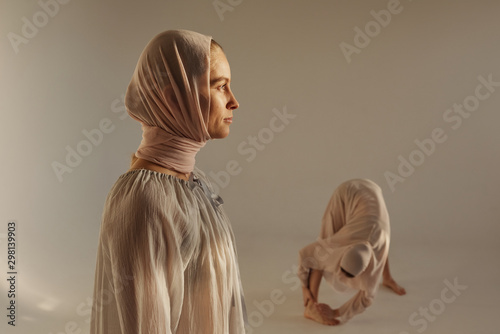 Pensive woman in national costume