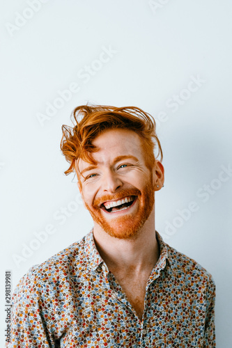 portraits of young redhead cool man photo