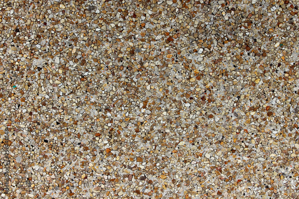 White-black-gray-brown tiny gravel stone as a background White-black-gray-brown tiny gravel stone as a background