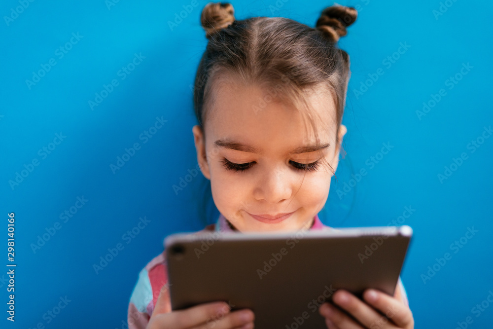 Cute girl using a tablet Cute girl using a tablet