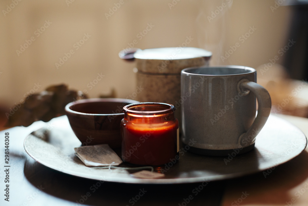 Still life of candle and cup of tea. Still life of candle and cup of tea.