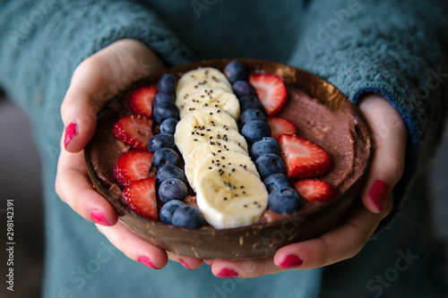 Healthy a?a? in a coconut bowl photo