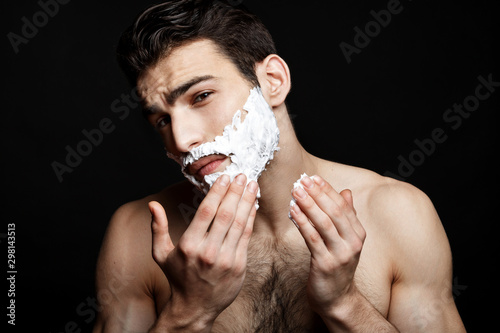 Man using shaving cream
