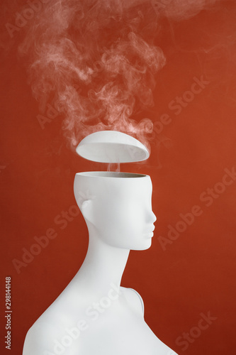 Smoke coming out of mannequin?s head. photo