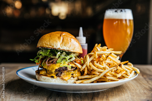 Double Cheeseburger with French Fries and a Beer photo