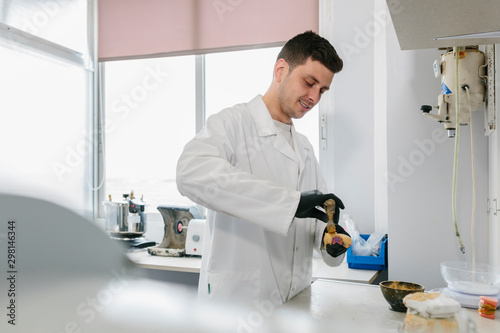 Orthodontists working in profesional dental lab