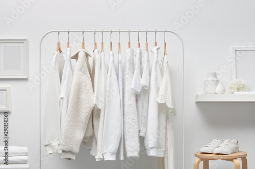 Interior of white cloakroom with rack