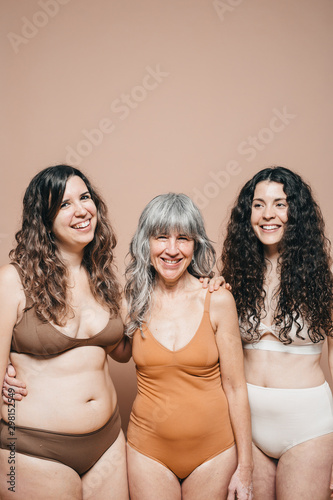 Mixed races and ages women laughing.