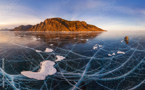 Aerial view of car crossing the frozen lake Baikal, Russia
